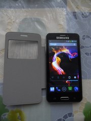 Мобильный телефон Samsung S 5 (экран 4, 5 Android 4,  2 сим карты)